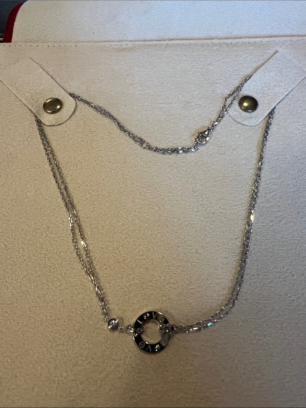 Cartier Silver Double-Chain Necklace with Circular Logo Pendant